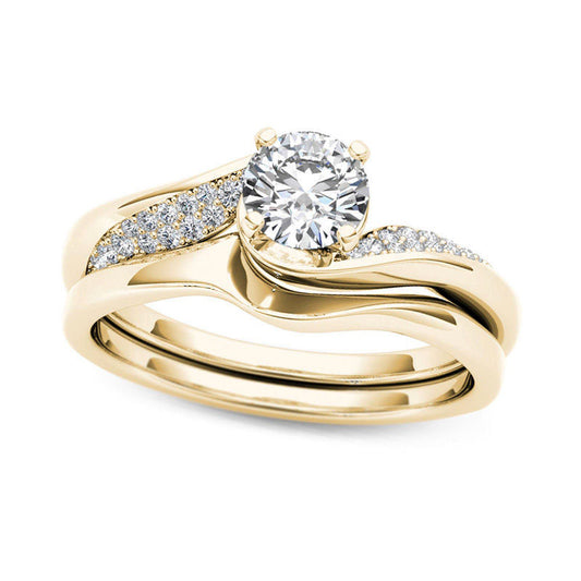 0.63 CT. T.W. Natural Diamond Twist Bypass Bridal Engagement Ring Set in Solid 14K Gold