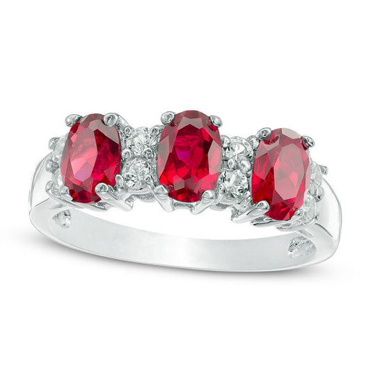 Oval Lab-Created Ruby and White Sapphire Three Stone Ring in Solid 10K White Gold