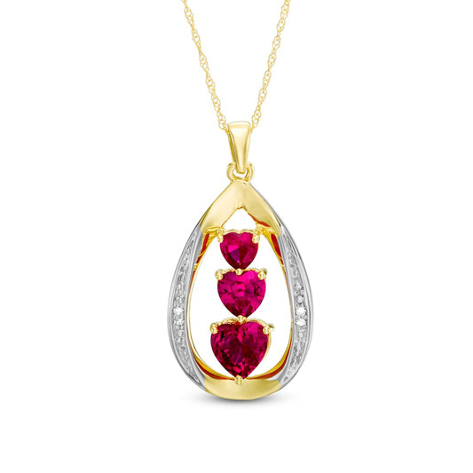 Heart-Shaped Lab-Created Ruby and Diamond Accent Linear Three Stone Pendant in 10K Yellow Gold