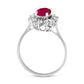 Oval Ruby and 0.50 CT. T.W. Natural Diamond Starburst Frame Ring in Solid 14K White Gold