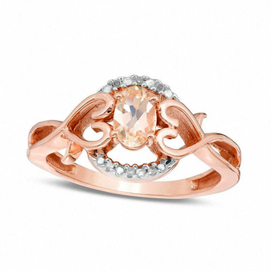 Oval Morganite and Natural Diamond Accent Twisting Heart Sides Ring in Solid 10K Rose Gold