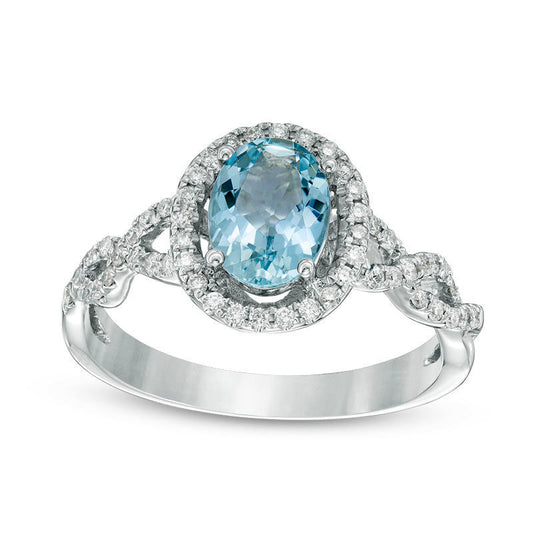 Oval Aquamarine and 0.20 CT. T.W. Natural Diamond Frame Twist Shank Ring in Solid 14K White Gold - Size 7