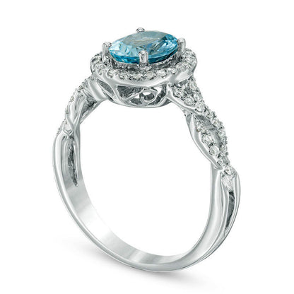 Oval Aquamarine and 0.20 CT. T.W. Natural Diamond Frame Twist Shank Ring in Solid 14K White Gold - Size 7