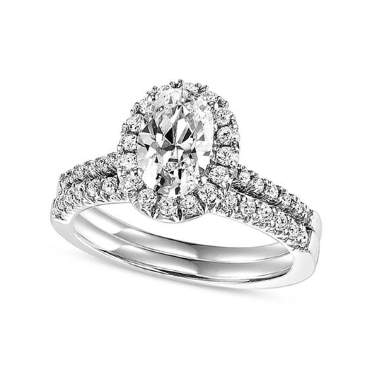 0.75 CT. T.W. Oval Natural Diamond Frame Bridal Engagement Ring Set in Solid 14K White Gold