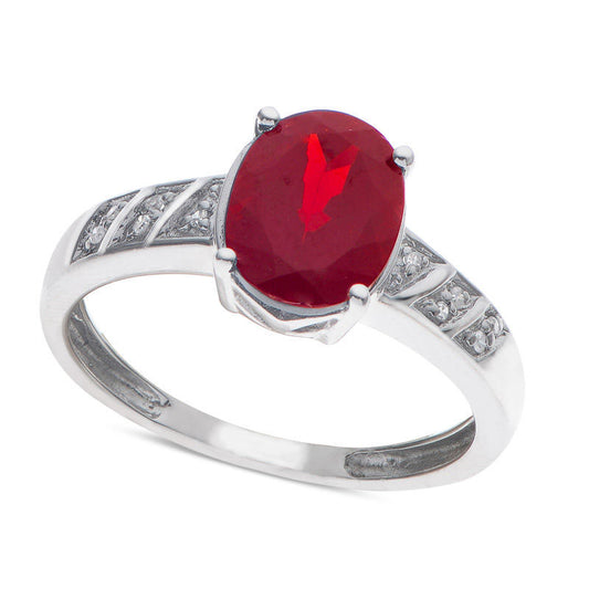 Oval Garnet and Natural Diamond Accent Ring in Sterling Silver