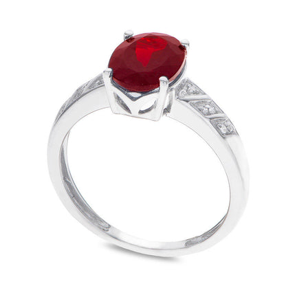 Oval Garnet and Natural Diamond Accent Ring in Sterling Silver