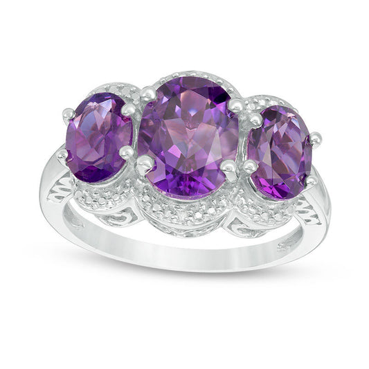 Oval Amethyst and Natural Diamond Accent Three Stone Frame Ring in Sterling Silver