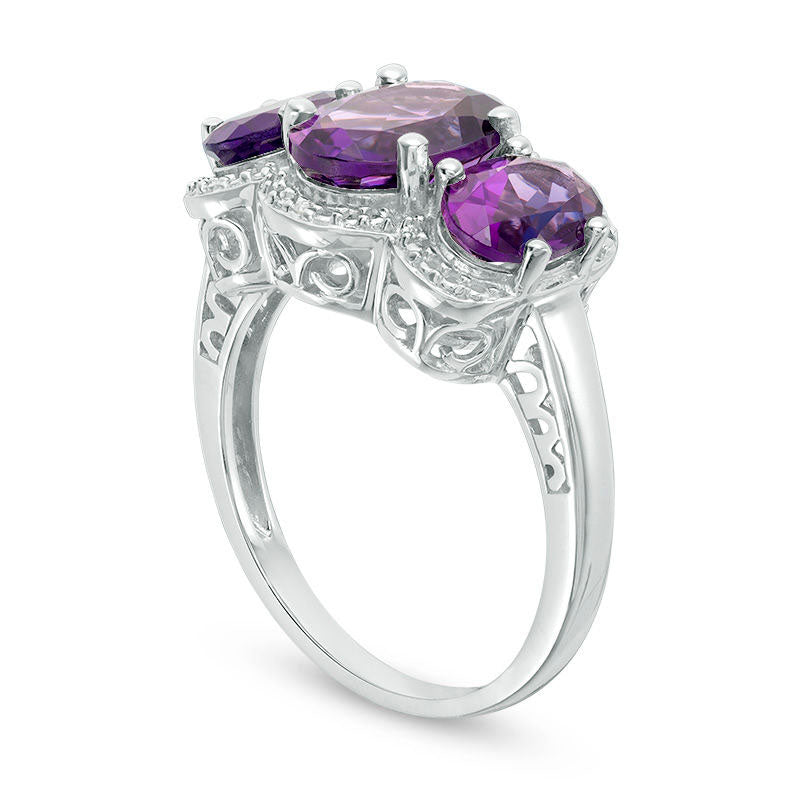 Oval Amethyst and Natural Diamond Accent Three Stone Frame Ring in Sterling Silver