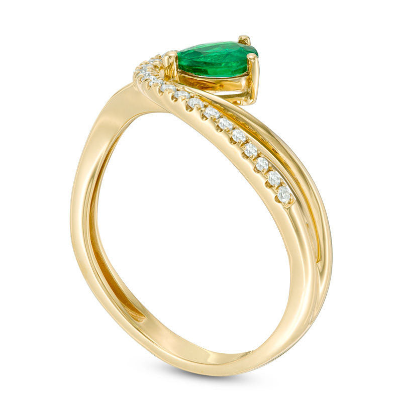 Pear-Shaped Emerald and 0.10 CT. T.W. Natural Diamond Swirl Bypass Ring in Solid 14K Gold