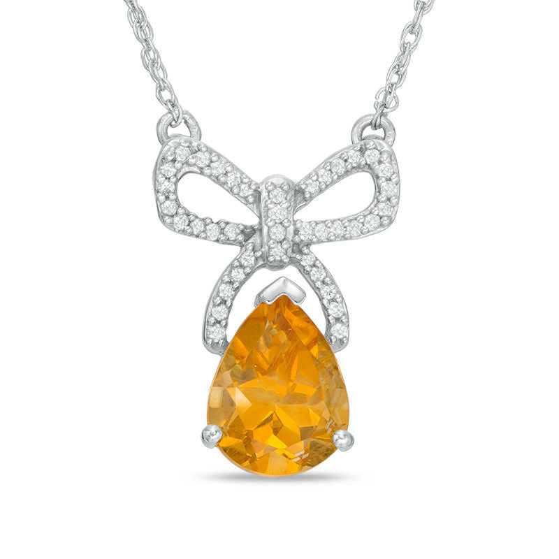 Pear-Shaped Citrine and 0.1 CT. T.W. Natural Diamond Bow Necklace in Sterling Silver