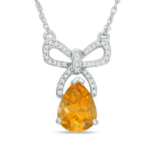 Pear-Shaped Citrine and 0.1 CT. T.W. Natural Diamond Bow Necklace in Sterling Silver