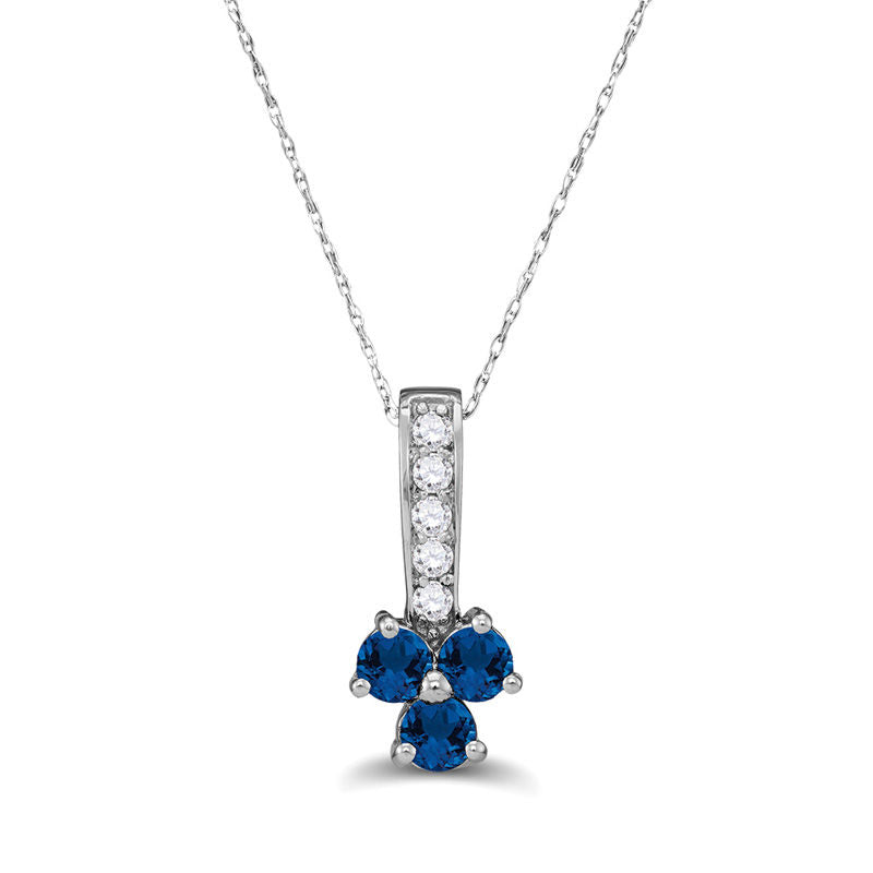 Blue Sapphire and 0.13 CT. T.W. Natural Diamond Trio Pendant in Sterling Silver