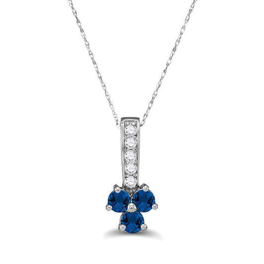 Blue Sapphire and 0.13 CT. T.W. Natural Diamond Trio Pendant in Sterling Silver