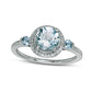Aquamarine and 0.17 CT. T.W. Natural Diamond Frame Three Stone Ring in Sterling Silver