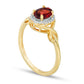 Oval Garnet and Natural Diamond Accent Twist Ring in Solid 10K Yellow Gold