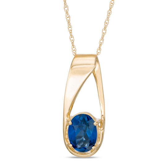 Oval Lab-Created Blue Sapphire Pendant in 10K Yellow Gold