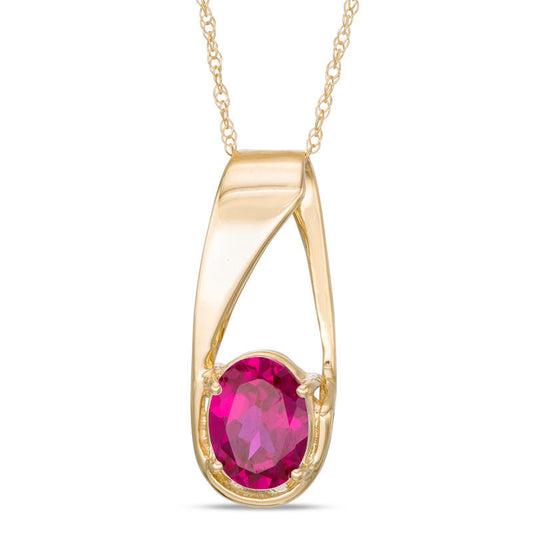 Oval Lab-Created Ruby Pendant in 10K Yellow Gold