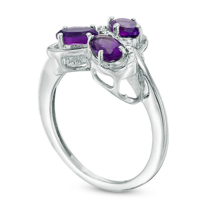 Oval Amethyst and Natural Diamond Accent Three Stone Swirl Ring in Sterling Silver