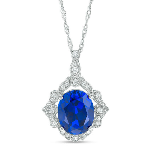 Oval Lab-Created Blue Sapphire and 0.17 CT. T.W. Diamond Antique Vintage-Style Vine Frame Pendant in 10K White Gold