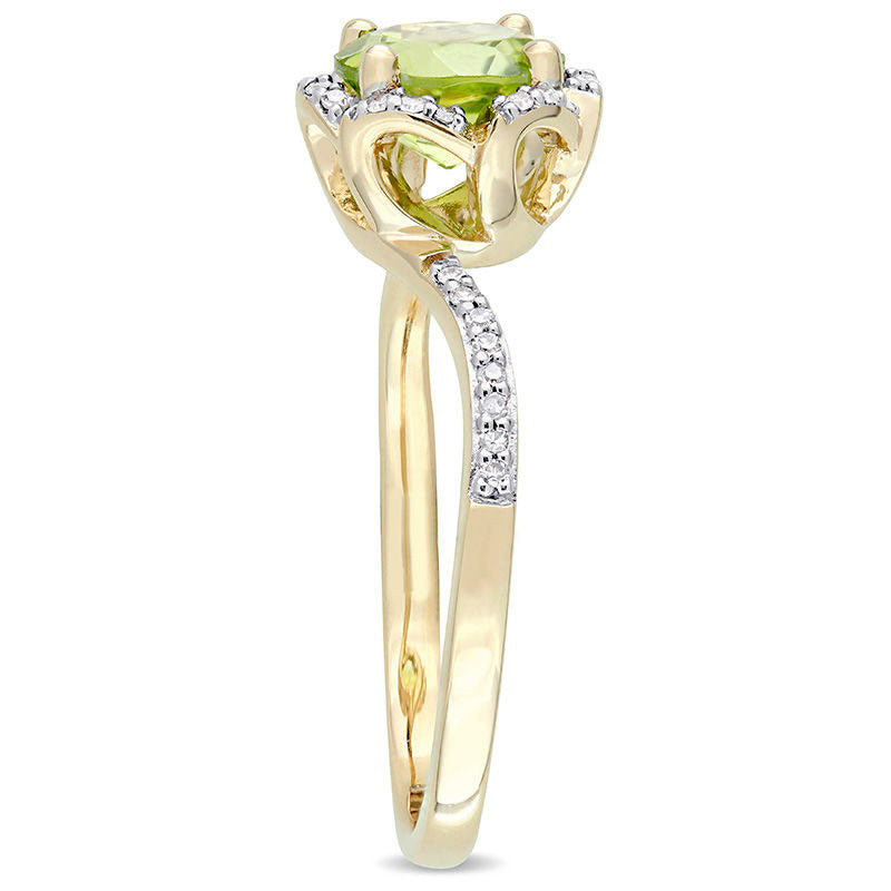 7.0mm Peridot and 0.10 CT. T.W. Natural Diamond Floral Frame Bypass Ring in Solid 14K Gold