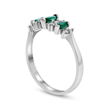 Marquise Emerald and 0.17 CT. T.W. Natural Diamond Seven Stone Illusion Anniversary Ring in Solid 14K White Gold
