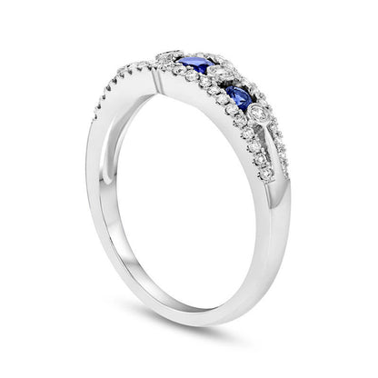 Blue Sapphire and 0.25 CT. T.W. Natural Diamond Seven Stone Anniversary Ring in Solid 14K White Gold
