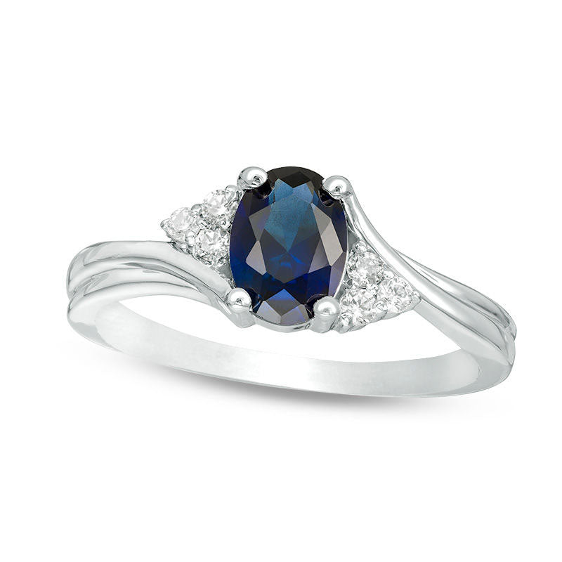 Oval Lab-Created Blue Sapphire and 0.10 CT. T.W. Diamond Tri-Sides Promise Ring in Solid 10K White Gold