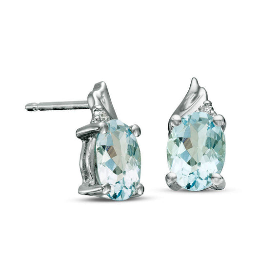 Oval Aquamarine and Diamond Accent Swirl Top Drop Earrings in 10K White Gold