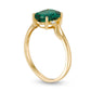 Oval Lab-Created Emerald and Diamond Accent Bypass Swirl Shank Ring in Solid 10K Yellow Gold