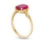 Oval Lab-Created Ruby and Diamond Accent Bypass Swirl Shank Ring in Solid 10K Yellow Gold