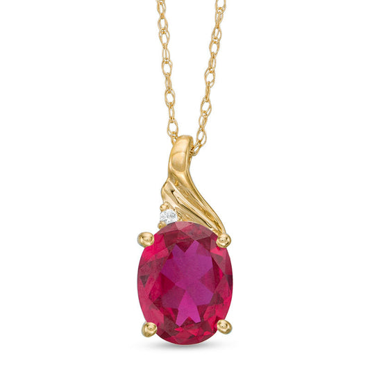 Oval Lab-Created Ruby and Diamond Accent Swirl Top Pendant in 10K Yellow Gold