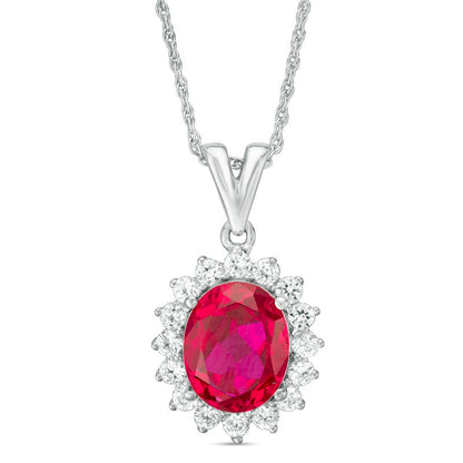 Oval Lab-Created Ruby and White Sapphire Sunburst Frame Pendant in Sterling Silver