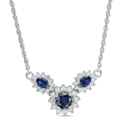 Oval and Round Lab-Created Blue and White Sapphire Sunburst Frame Three Stone Necklace in Sterling Silver