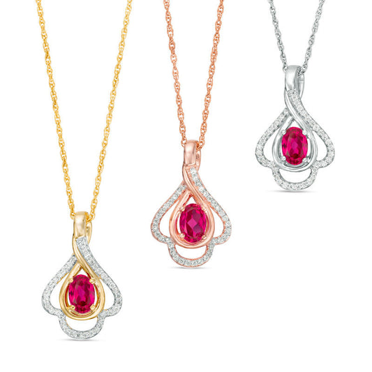 Oval Lab-Created Ruby and 0.17 CT. T.W. Diamond Teardrop Frame Leaf Pendant in 10K White, Yellow or Rose Gold