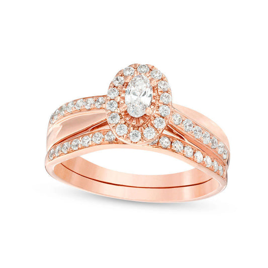 0.75 CT. T.W. Oval Natural Diamond Frame Crossover Bridal Engagement Ring Set in Solid 14K Rose Gold