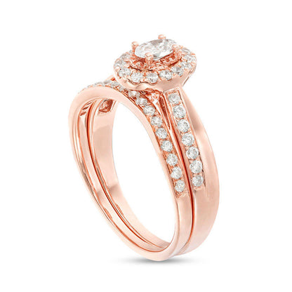 0.75 CT. T.W. Oval Natural Diamond Frame Crossover Bridal Engagement Ring Set in Solid 14K Rose Gold