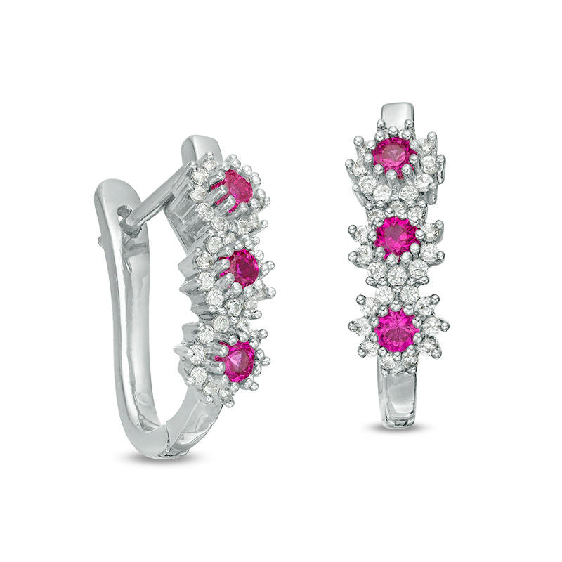 Lab-Created Ruby and 0.2 CT. T.W. Diamond Three Stone Sunburst Hoop Earrings in 10K White Gold
