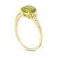 7.0mm Peridot and 0.13 CT. T.W. Natural Diamond Engagement Ring in Solid 10K Yellow Gold