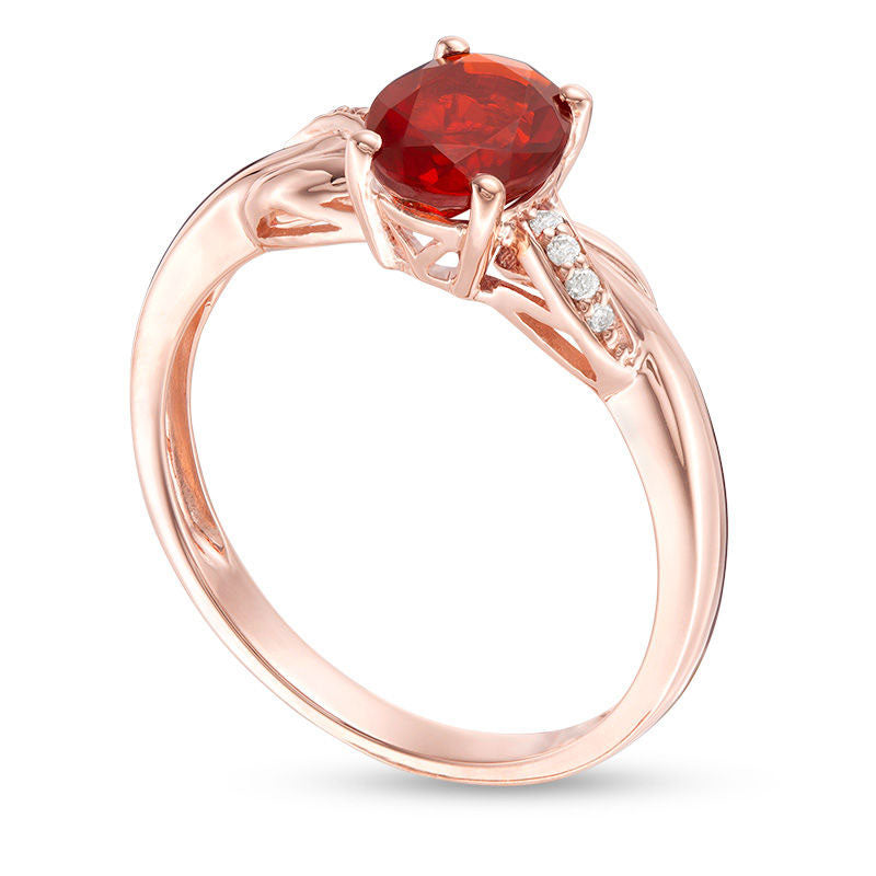 Oval Fire Opal and Natural Diamond Accent Infinity Knot Ring in Solid 10K Rose Gold