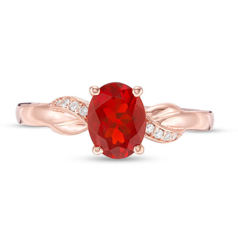 Oval Fire Opal and Natural Diamond Accent Infinity Knot Ring in Solid 10K Rose Gold