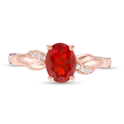 Oval Fire Opal and Natural Diamond Accent Infinity Knot Ring in Solid 10K Rose Gold