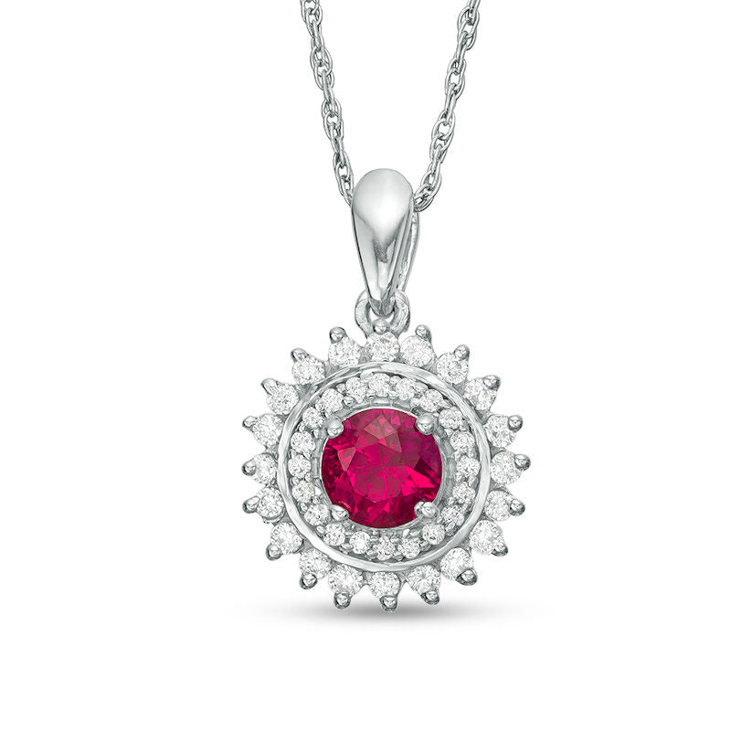Lab-Created Ruby and 0.25 CT. T.W. Diamond Sunburst Frame Pendant in Sterling Silver