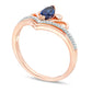 Marquise Lab-Created Blue Sapphire and 0.05 CT. T.W. Diamond Scroll Accent Chevron Promise Ring in Solid 10K Rose Gold