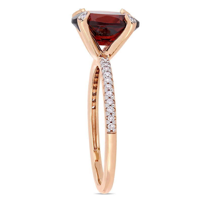 Oval Garnet and 0.10 CT. T.W. Natural Diamond Engagement Ring in Solid 10K Rose Gold