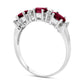 Sideways Oval Ruby and 0.10 CT. T.W. Natural Diamond Three Stone Ring in Solid 14K White Gold