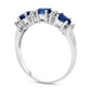 Sideways Oval Blue Sapphire and 0.10 CT. T.W. Natural Diamond Three Stone Ring in Solid 14K White Gold