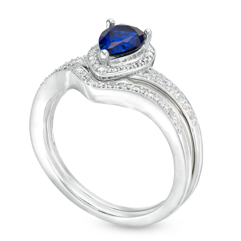 Pear-Shaped Lab-Created Blue Sapphire and 0.25 CT. T.W. Diamond Frame Chevron Bridal Engagement Ring Set in Sterling Silver