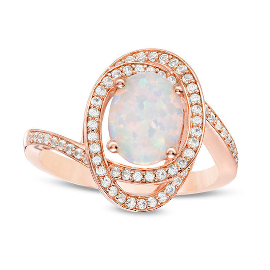 Oval Opal and 0.33 CT. T.W. Natural Diamond Bypass Orbit Ring in Solid 10K Rose Gold