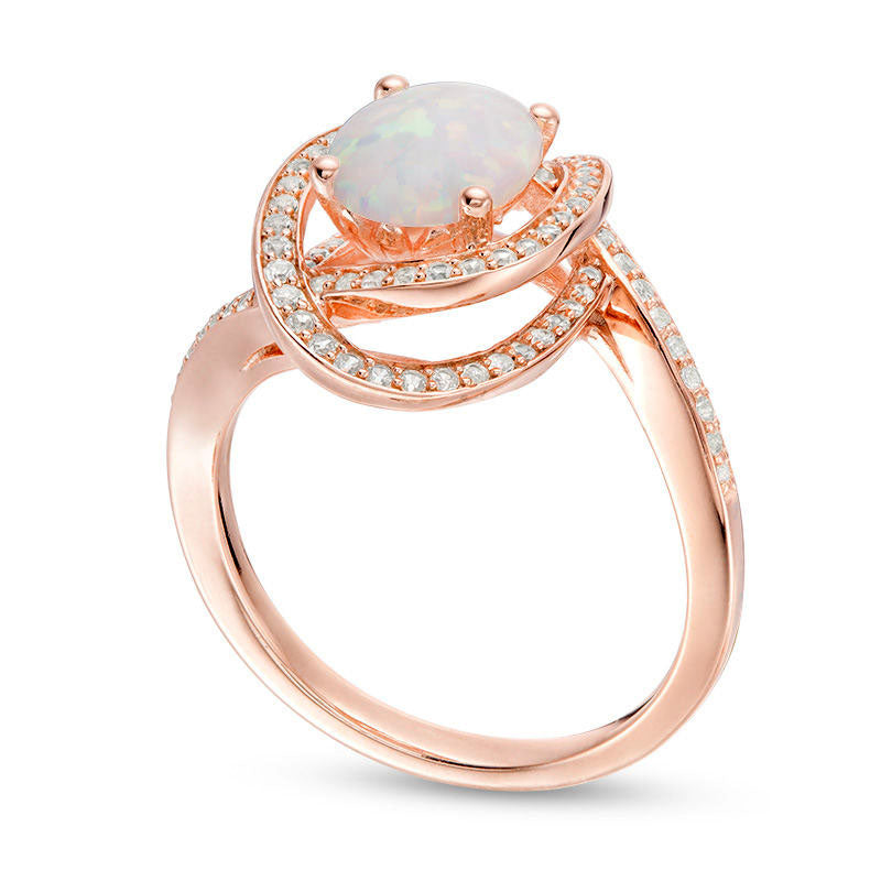 Oval Opal and 0.33 CT. T.W. Natural Diamond Bypass Orbit Ring in Solid 10K Rose Gold