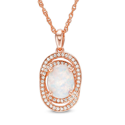 Oval Opal and 0.25 CT. T.W. Natural Diamond Orbit Frame Pendant in 10K Rose Gold